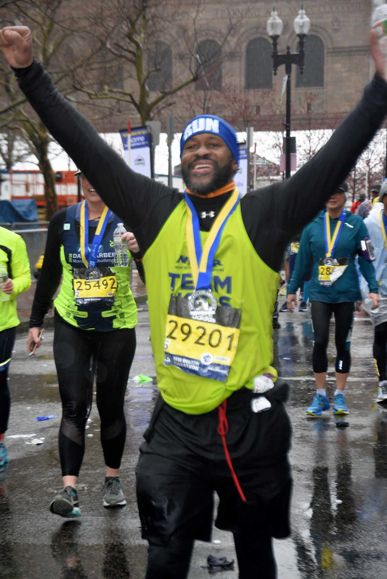 Gary Purdy celebrating after finishing the Boston Marathon